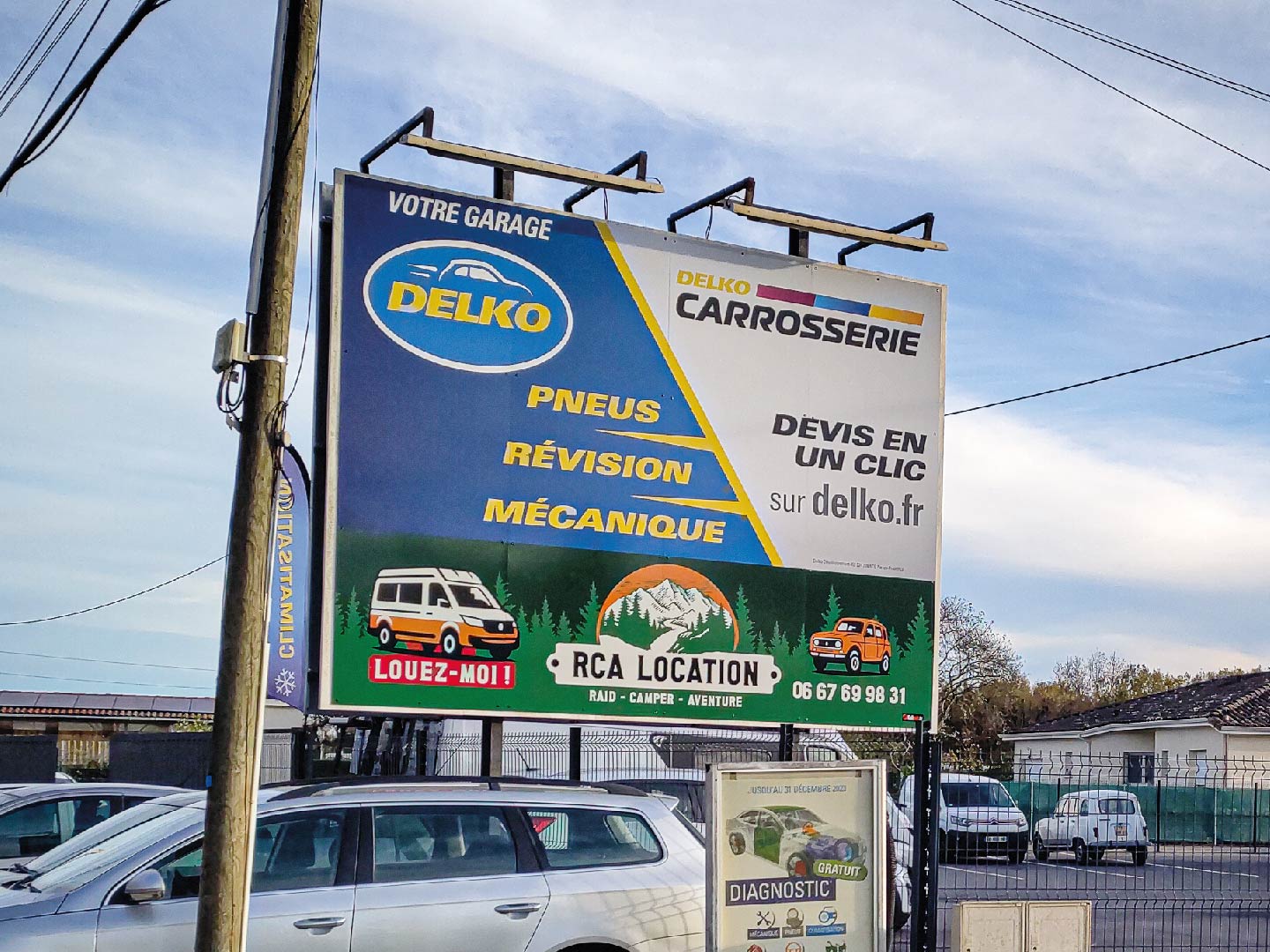 Panneau publicitaire pour le garage Delko